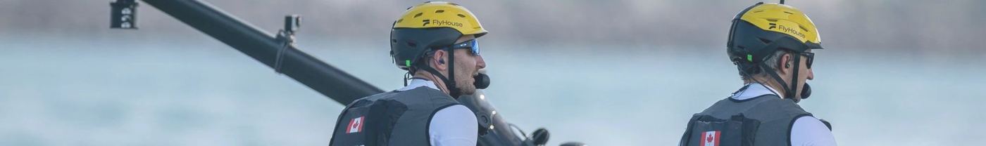 NorthStar SailGP crew in helmets on the F50